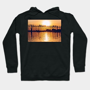 Orange Sundown Behind Long Wooden Bridge in Mandalay, Burma Hoodie